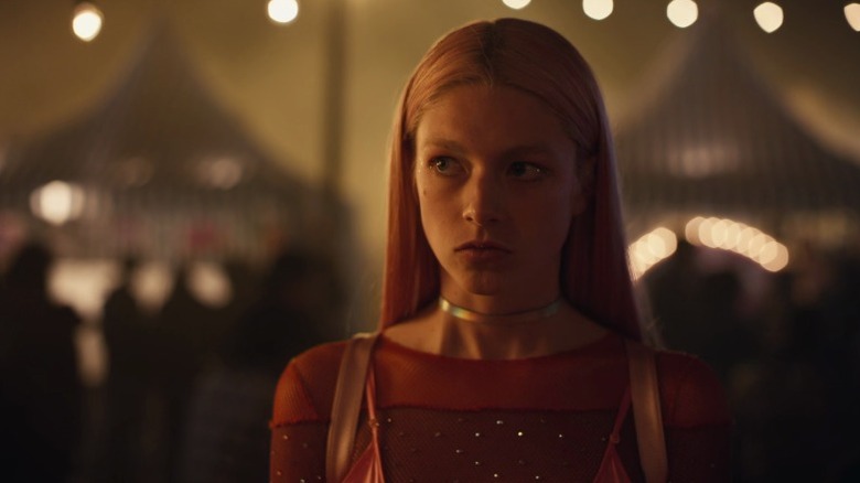 Jules (Hunter Schafer) standing and looking up awkwardly on Euphoria S1E4