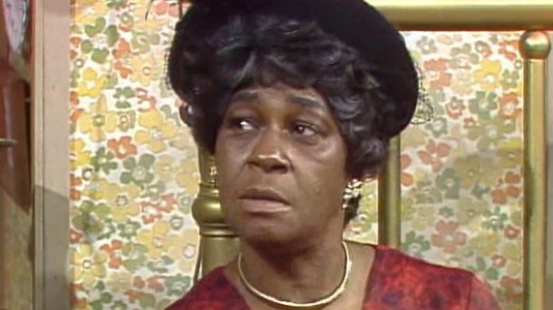 Aunt Esther sitting and looking to her right on Sanford and Son S3E2