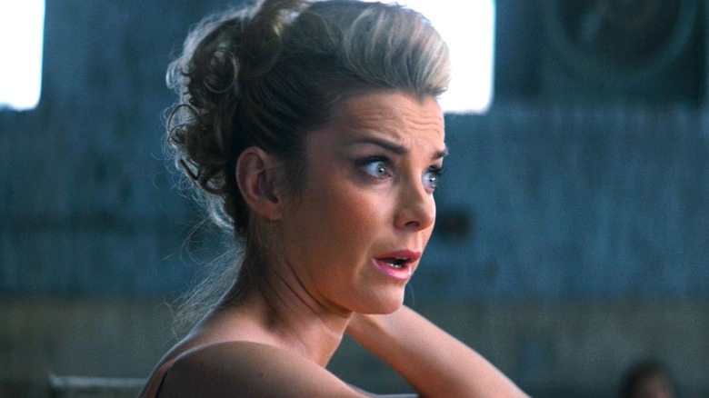 Betty Gilpin as Debbie looking worried in GLOW