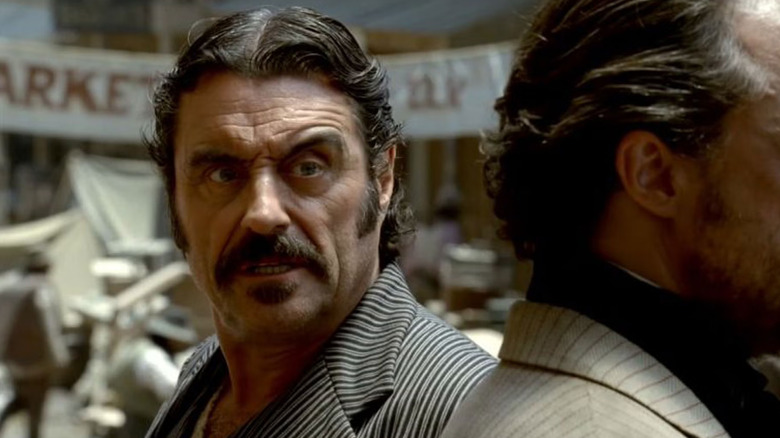 Ian McShane as Al Swearengen grimacing in Deadwood