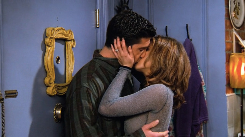 Ross kissing Rachel in front of door