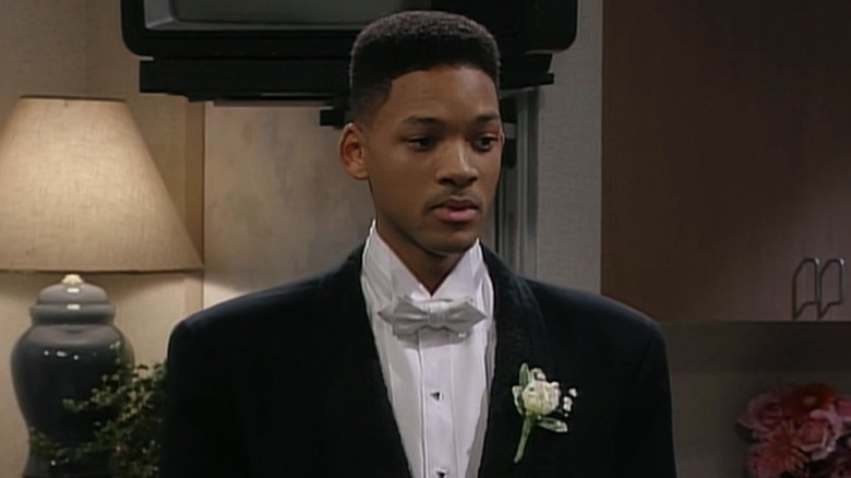 Will standing in tux and looking serious