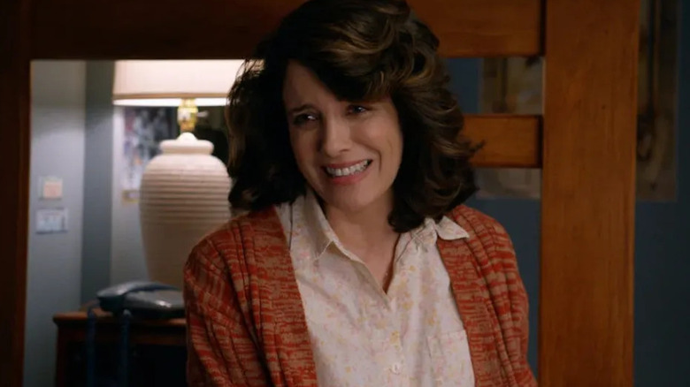 Alanna Ubach as Susan smiling in Ted