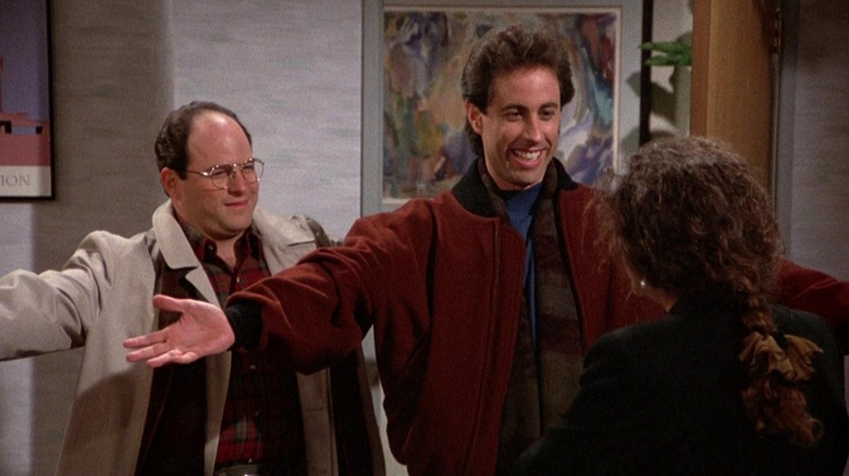 George Costanza holds his hands out with Jerry in Seinfeld