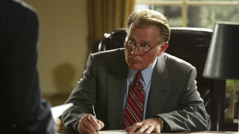 President Josiah Bartlet writes on a paper in The West Wing