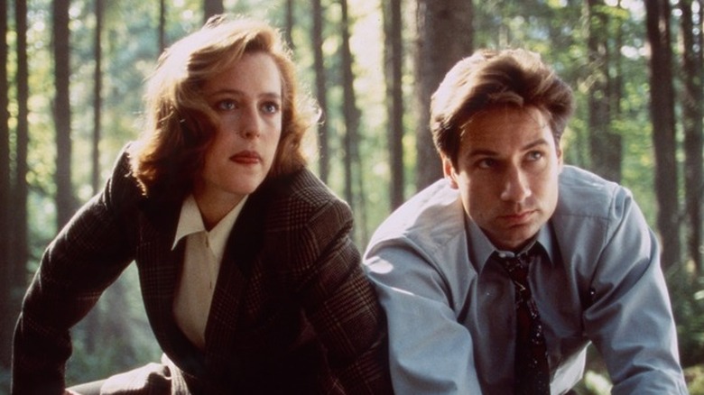 Fox Mulder next to Dana Scully in The X-Files