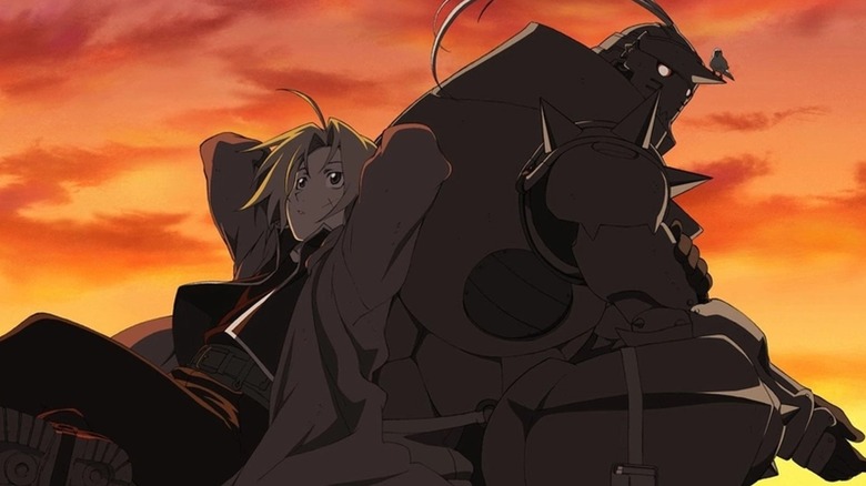 Edward and Alphonse Elric sit in a sunset in Fullmetal Alchemist: Brotherhood.