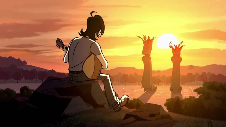 Lance plays guitar in a sunset in Sym-Bionic Titan.
