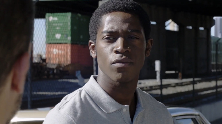 Franklin Saint (Damson Idris) talking to someone in Snowfall
