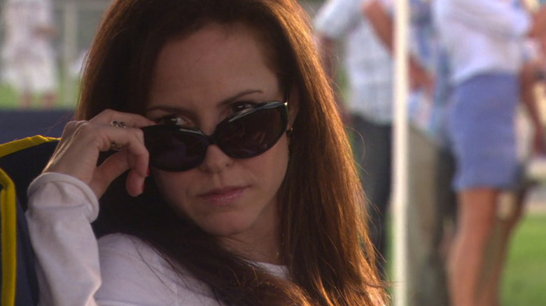 Nancy Botwin (Mary-Louise Parker) lowers her shades in Weeds