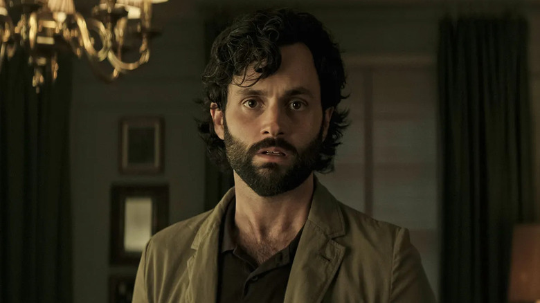 Penn Badgley as Joe Goldberg looking shocked in You