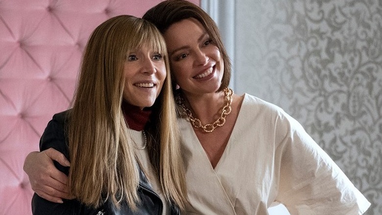Katherine Heigl as Tully with arm around Sarah Chalke as Kate in Firefly Lane