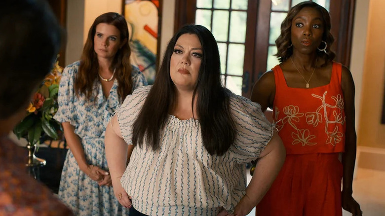 JoAnna Garcia Swisher as Maddie standing next to Brooke Elliot as Dana and Heather Headley as Helen in Sweet Magnolias