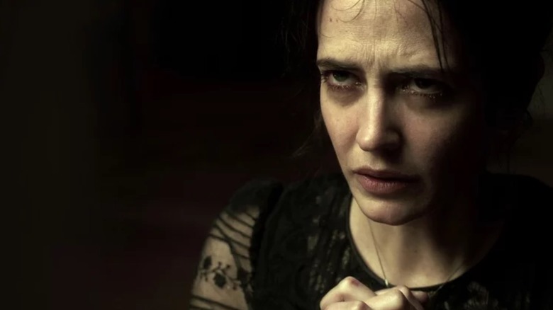 Vanessa Ives (Eva Green) praying in Penny Dreadful