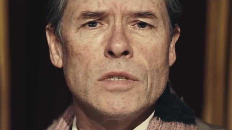 Guy Pearce's Kim Philby looking sad on A Spy Among Friends