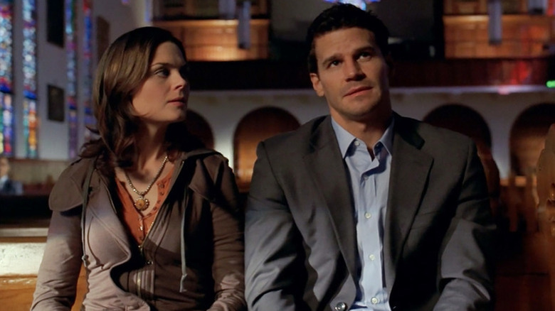 Emily Deschanel as Bones sitting next to David Boreanaz as Booth in church pew in Bones