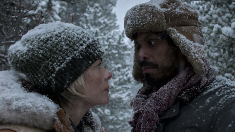 Rose (Jaime King) and Boone (Manuel Rodriguez-Saenz) looking at each other on "Black Summer."