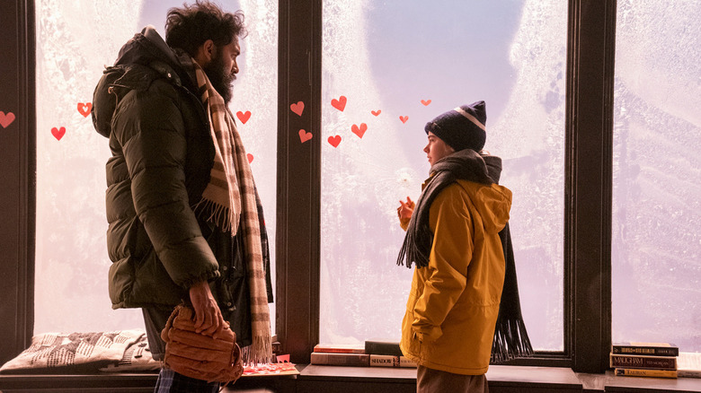 Jeevan (Himesh Patel) and Kirsten (Matilda Lawler) looking at each other on "Station Eleven."
