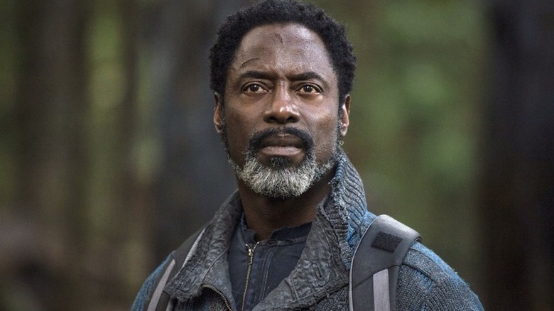 Thelonious Jaha (Isaiah Washington) looking at something on "The 100."