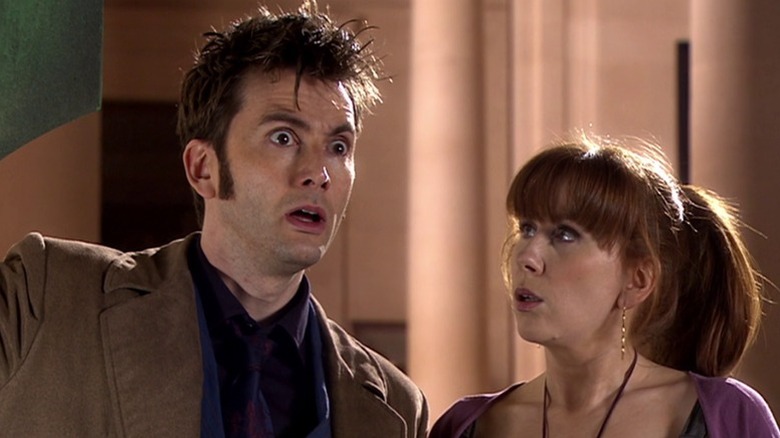 The Tenth Doctor gazing out in bemusement while Donna looks at him on Doctor Who S4E8