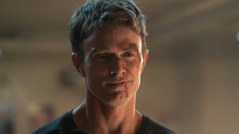 Wilson Bethel as Bullseye, smirking in Daredevil: Born Again.