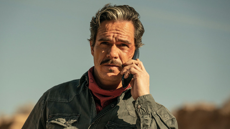 Tony Dalton as Lalo Salamanca, calling someone on a phone in Better Call Saul.