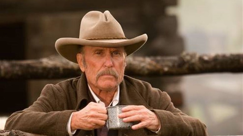 Robert Duvall as Prentice Ritter holds a coffee cup in Broken Trail