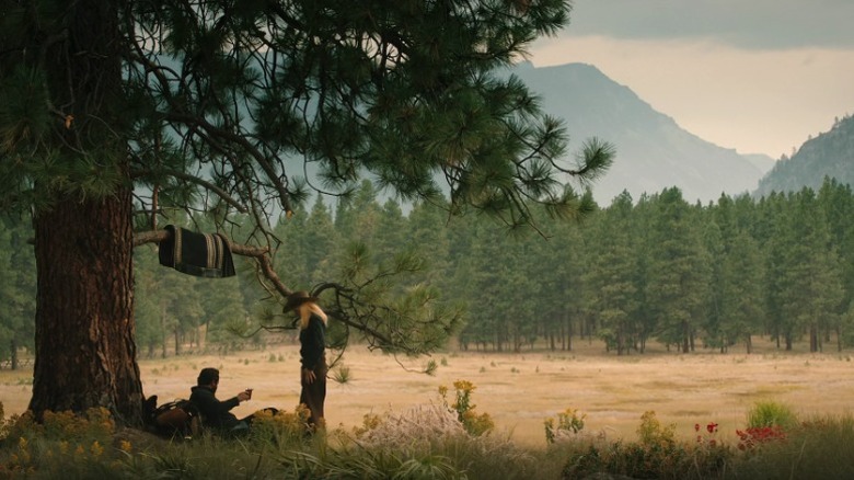 Rip and Beth under a tree on Yellowstone S5E6