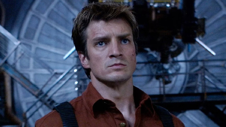 Nathan Fillion as Malcolm Reynolds, angry in Firefly.