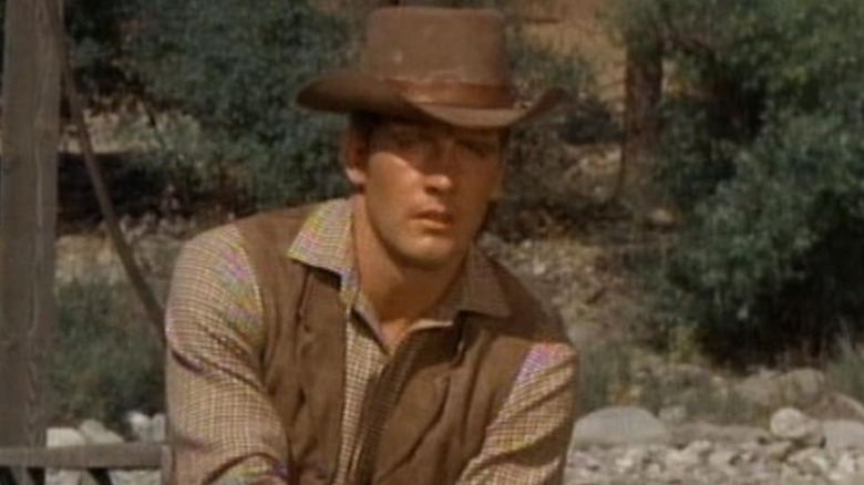 Charles Briles as Eugene Barkley, riding a horse in The Big Valley.