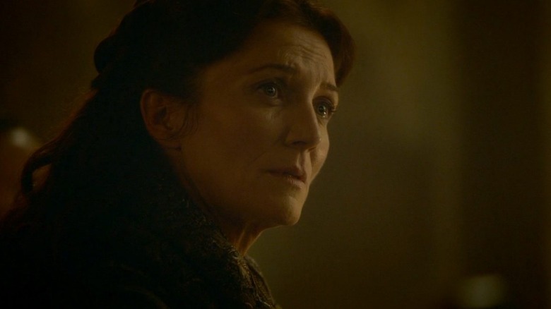 Michelle Fairley as Catelyn Stark looking worried in Game of Thrones