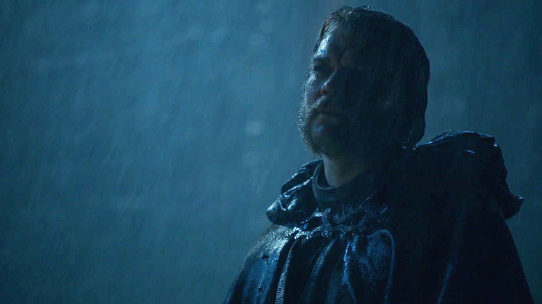 Pilou Asbæk as Euron Greyjoy standing in the rain in Game of Thrones