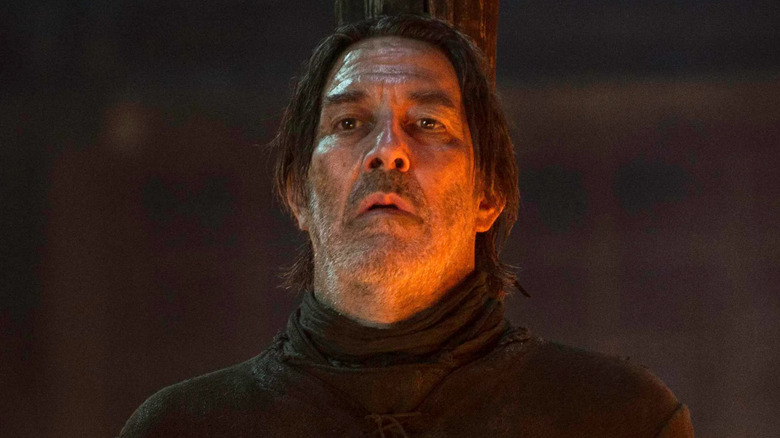 Ciaran Hinds as Mance Rayder tied to a burning stake in Game of Thrones