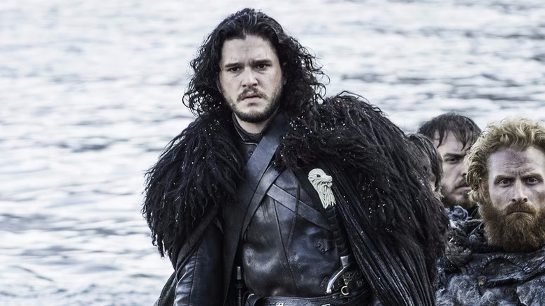 Kit Harington as Jon Snow on a boat with Kristofer Hivju as Tormund in Game of Thrones