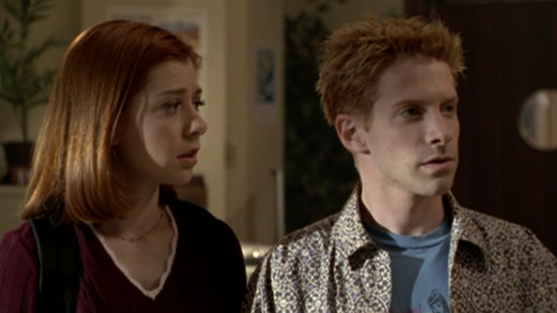 Alyson Hannigan as Willow and Seth Green as Oz in the library in "Buffy the Vampire Slayer."