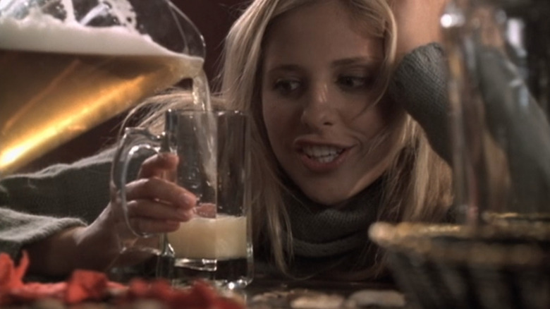 Sarah Michelle Gellar as Buffy looked at beer being poured in "Buffy the Vampire Slayer."