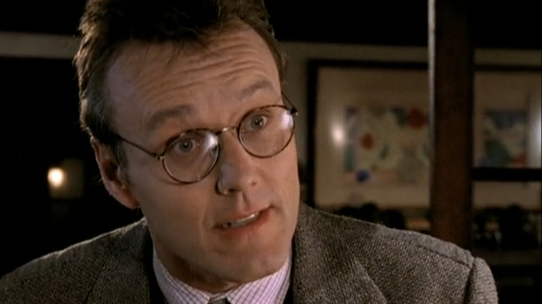 Anthony Stewart Head as Rupert Giles lecuting Buffy in the library on "Buffy the Vampire Slayer."