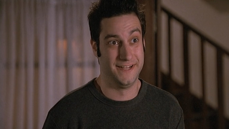 Adam Busch playing Willow trapped in Warren's body while smiling in "Buffy the Vampire Slayer."