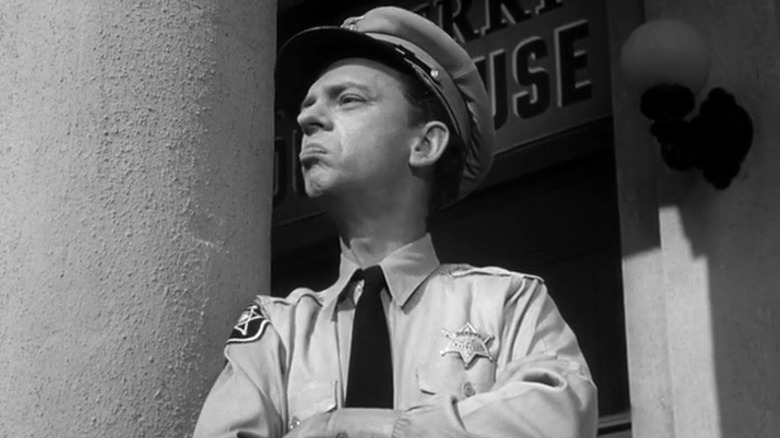 Barney looking up with his arms crossed on The Andy Griffith Show S1E20