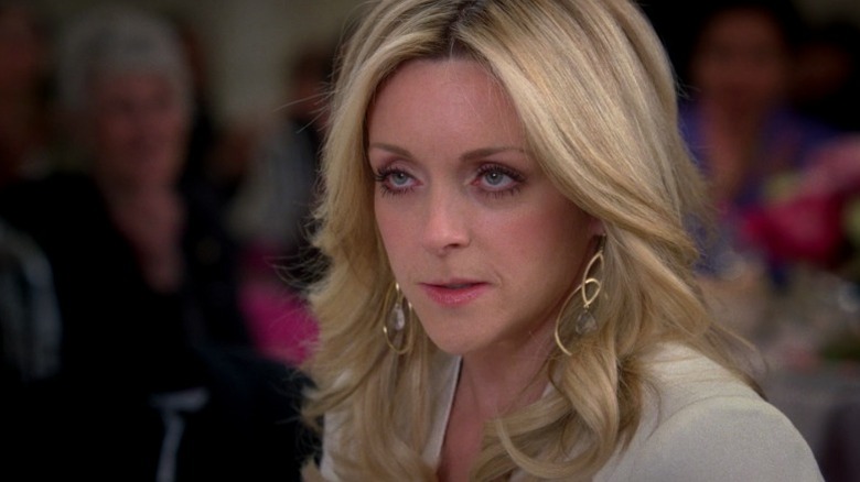 Jenna glaring under dramatic lighting on 30 Rock S7E8