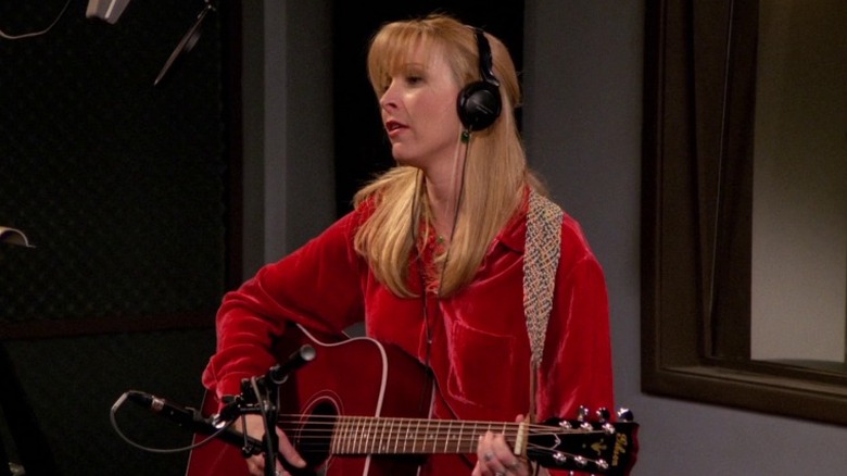 Phoebe singing in the studio on Friends S2E17