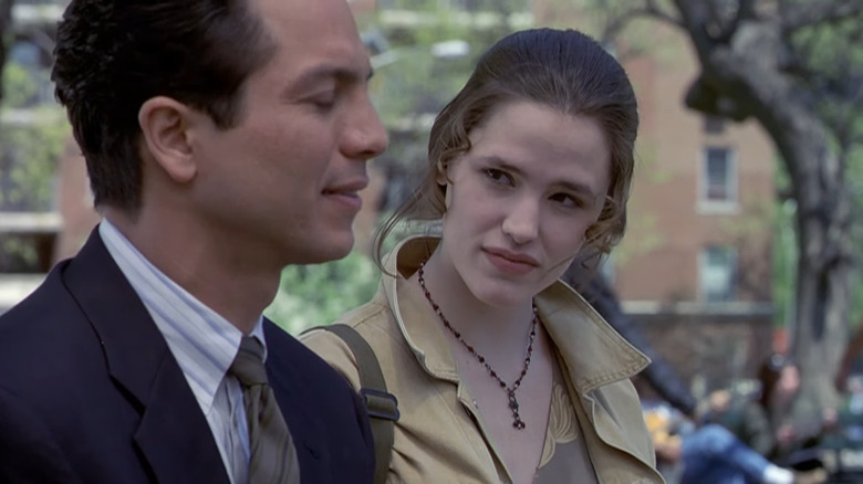 Benjamin Bratt and Jennifer Garner as Rey Curtis and Jaime, talking in a park in Law & Order.