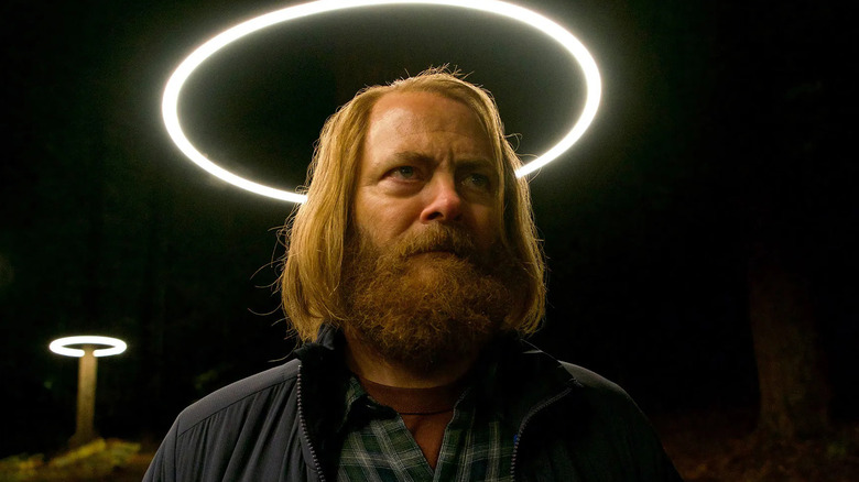 Nick Offerman as Forest, lit by a halo of light in Devs.