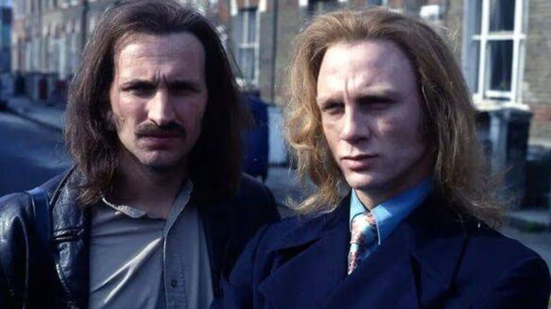 Christopher Eccleston as Nicky Hutchinson and Daniel Craig as Geordie Peacock, scowling in Our Friends in the North.