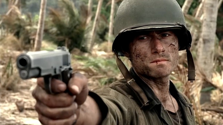 James Badge Dale as Private Robert Leckie, aiming a gun in The Pacific.