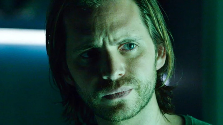 Aaron Stanford's James Cole frowning on 12 Monkeys