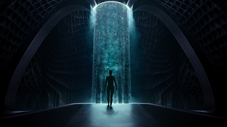 A shadowy character walking to a glowing pillar in Raised by Wolves