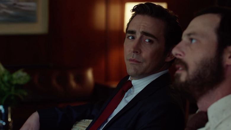 Joe MacMillan looking at Gordon Clark