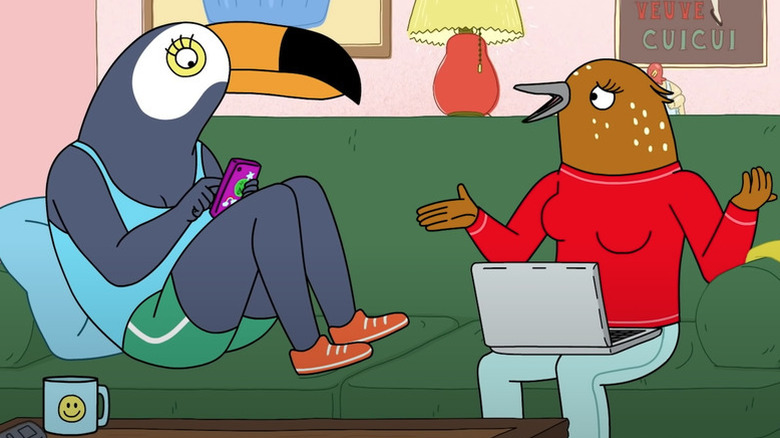 Animated birds Tuca and Bertie sitting on couch
