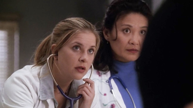 Kellie Martin as Lucy Knight looks concerned on ER